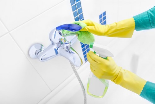 Bathroom surface cleaning during a move in cleaning service