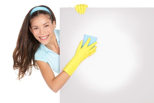 Vacuuming a mattress during routine mattress cleaning at home